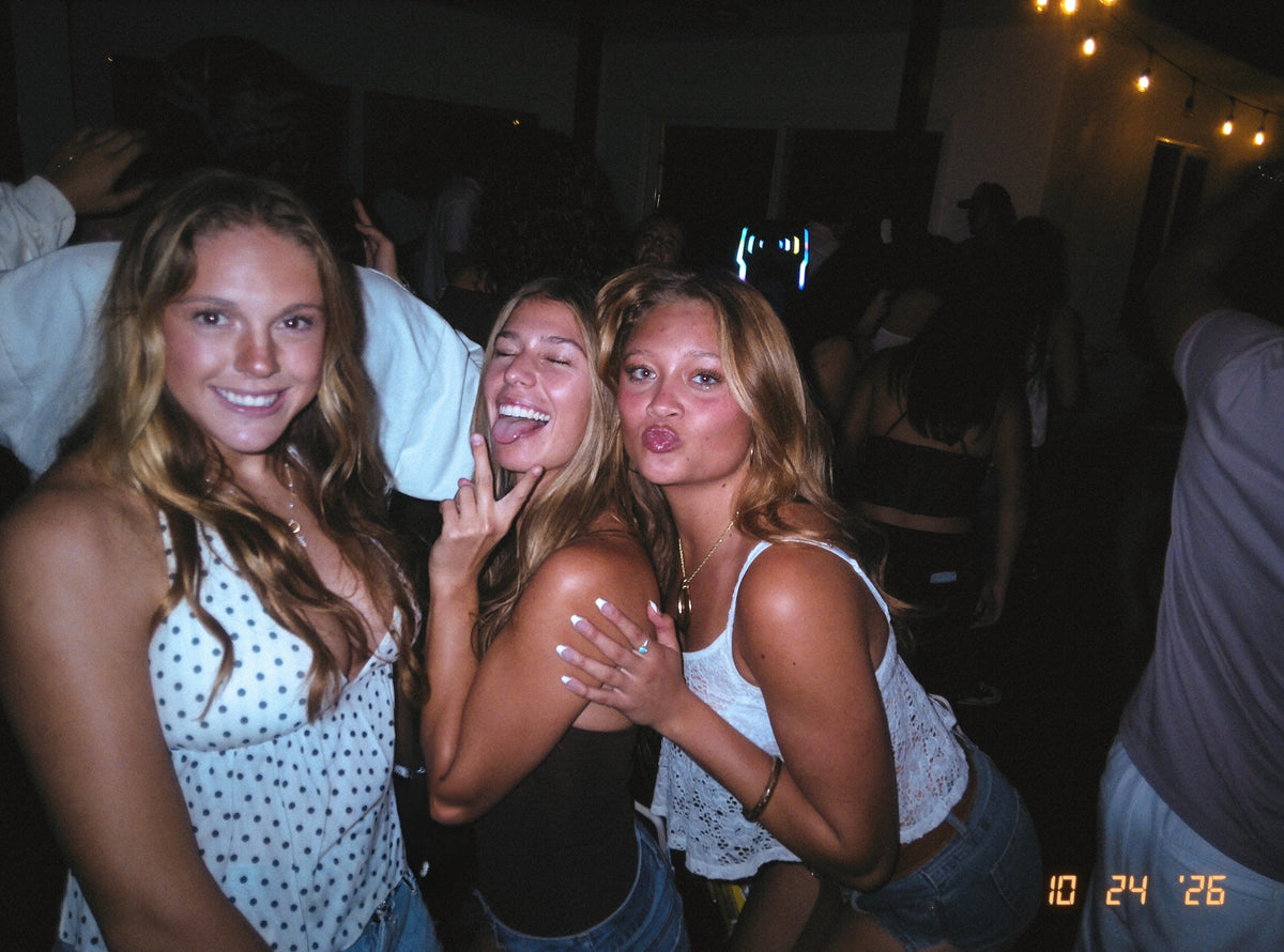 A real DigiFilm photograph of friends on a night out.